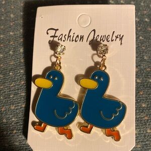 Blue Duck Earrings with rhinestone at top.